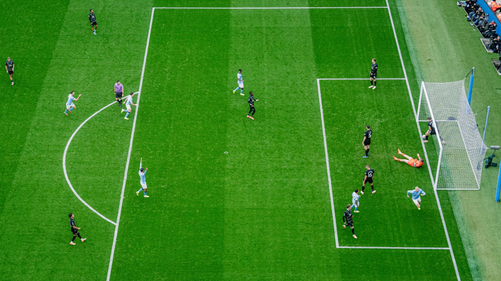 VIEW TO A THRILL: Erling Haaland wheels away in delight after his first goal.