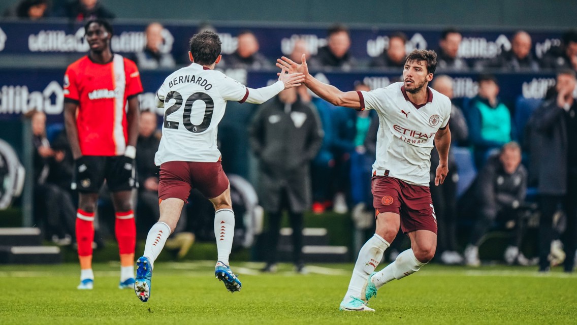 HIGH FIVES: Bernardo and Dias celebrate.