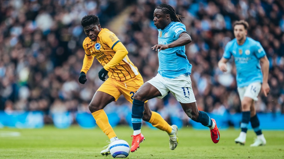 CUTTING IN : Jeremy Doku runs at his man