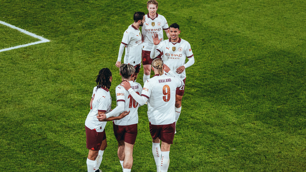 ALL SMILES : The players celebrate with Haaland again.