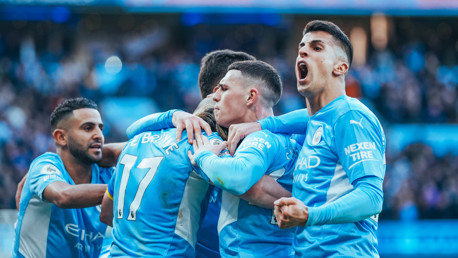 FEELING THE LOVE: KDB is mobbed after restoring City's lead.