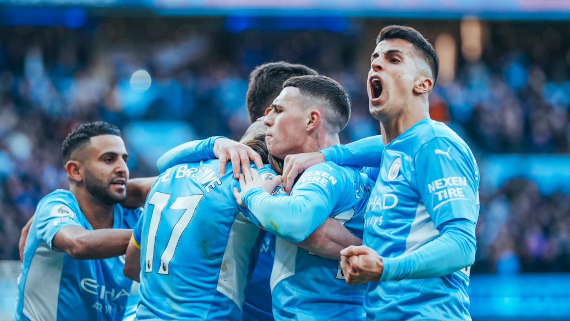 FEELING THE LOVE: KDB is mobbed after restoring City's lead.