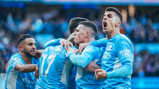 FEELING THE LOVE: KDB is mobbed after restoring City's lead.
