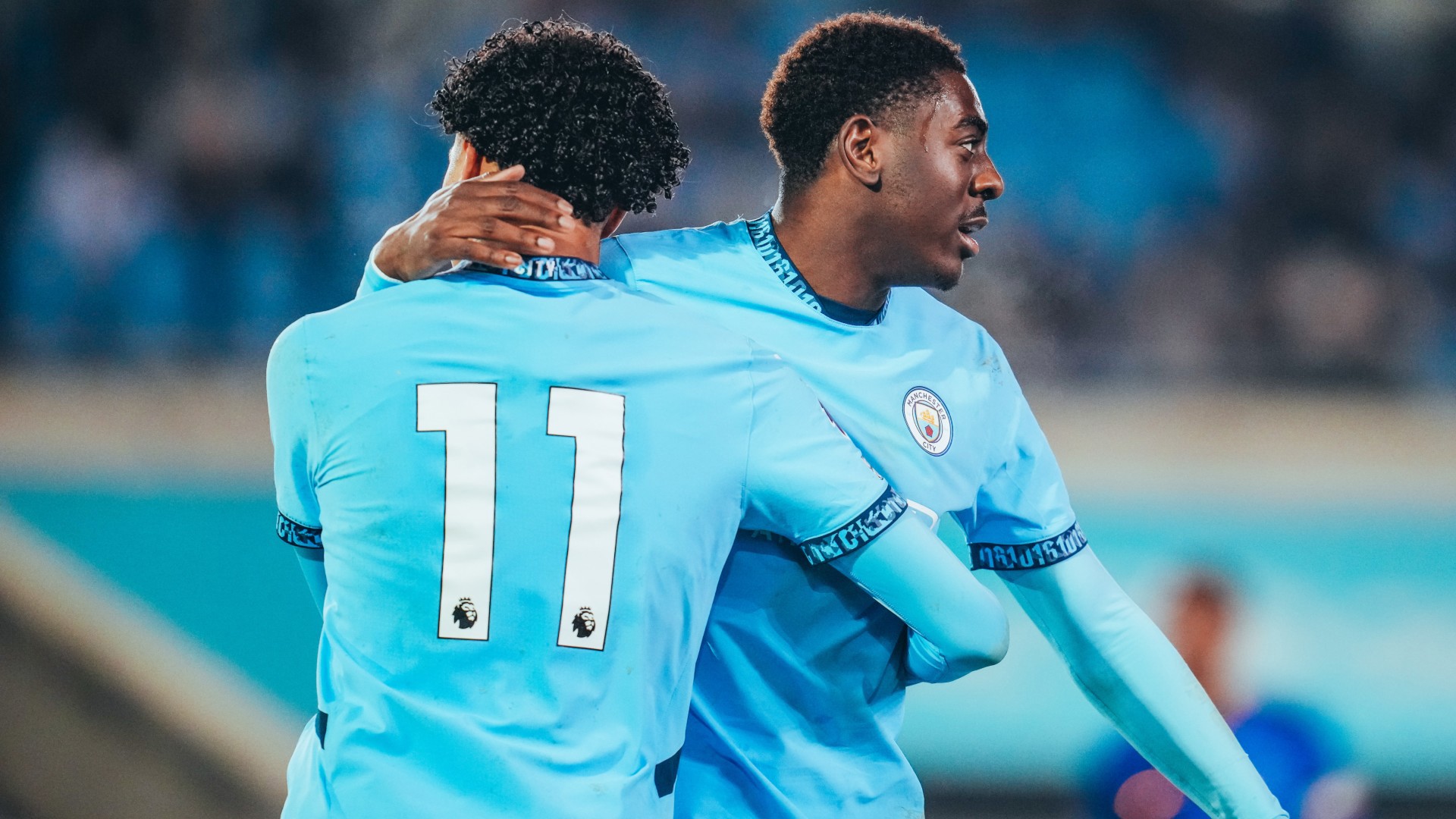 MAN OF THE MOMENT: Divin Mubama celebrates with Emilio Lawrence.