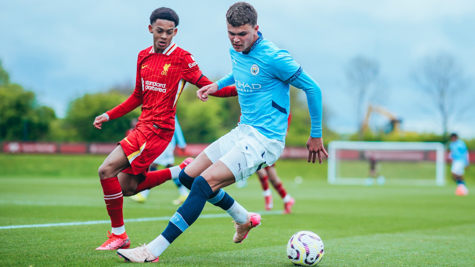 DYNAMIC DEFENDER : Harrison Parker under pressure.