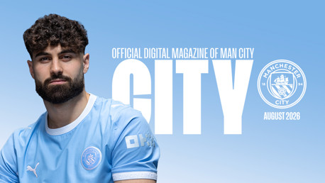 Manchester City's official digital magazine cover featuring a player in a light blue jersey, set against a gradient blue background with the text 'Official Digital Magazine of Man City' and 'August 2026'.