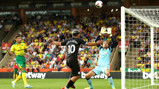 CLOSE: Aguero's header goes just over the bar
