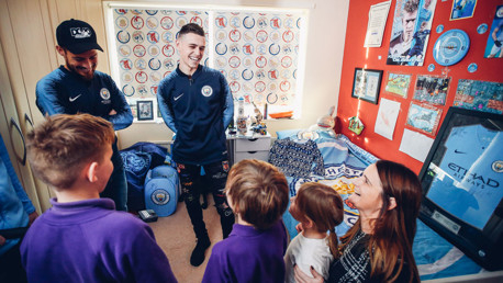 XMAS SURPRISE: David Silva and Phil Foden gave the Clark's a wonderful surprise 
