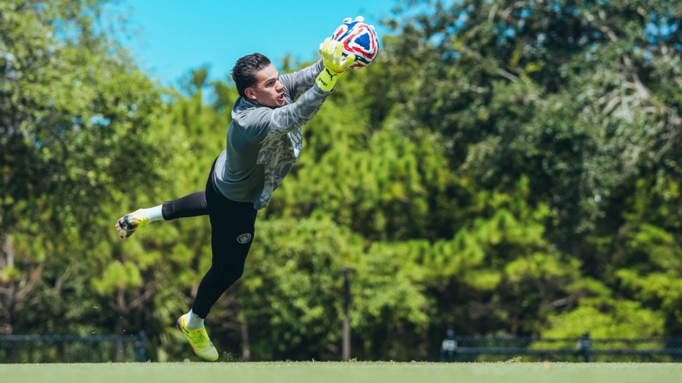 HIGH FLIER: Ederson takes to the Florida skies to produce a superb save.