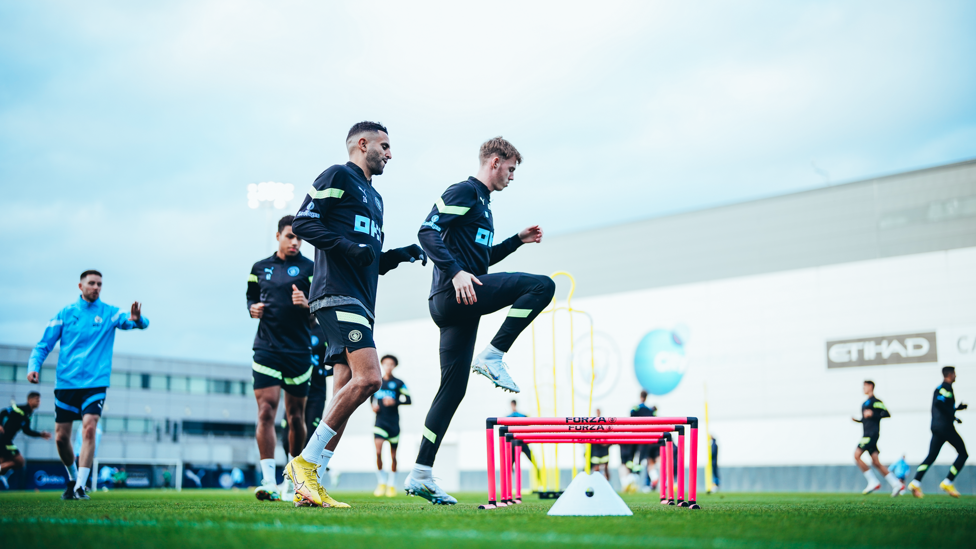 KNEES UP : Riyad Mahrez and Cole Palmer go through some early drills