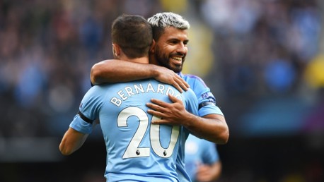 IN SYNC: Bernardo Silva and Sergio Aguero celebrate the former's late strike.