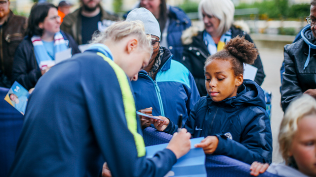 ROLE MODEL: Academy product Esme Morgan signs an autograph for Hannah for City 10s