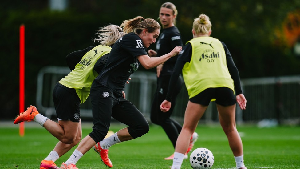 BATTLING  : Sydney Lohmann looks to maintain possession. 