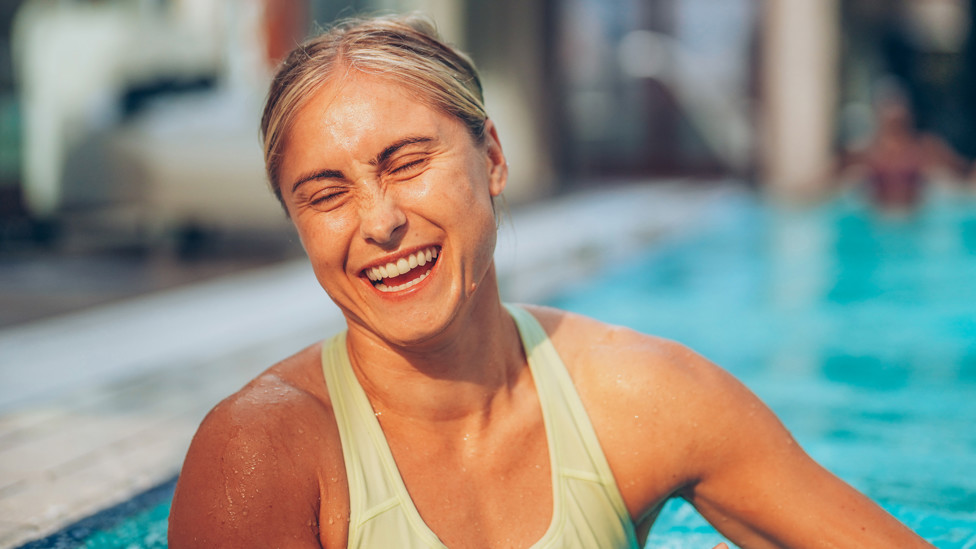 CHEERS! Skipper Steph Houghton gets the giggles!