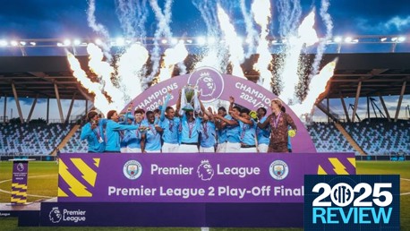 A team in blue uniforms celebrates on stage with a trophy, fireworks in the background. Banner reads 'Premier League 2 Play-Off Final Champions 2024/25'.