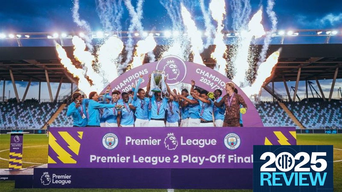 A team in blue uniforms celebrates on stage with a trophy, fireworks in the background. Banner reads 'Premier League 2 Play-Off Final Champions 2024/25'.