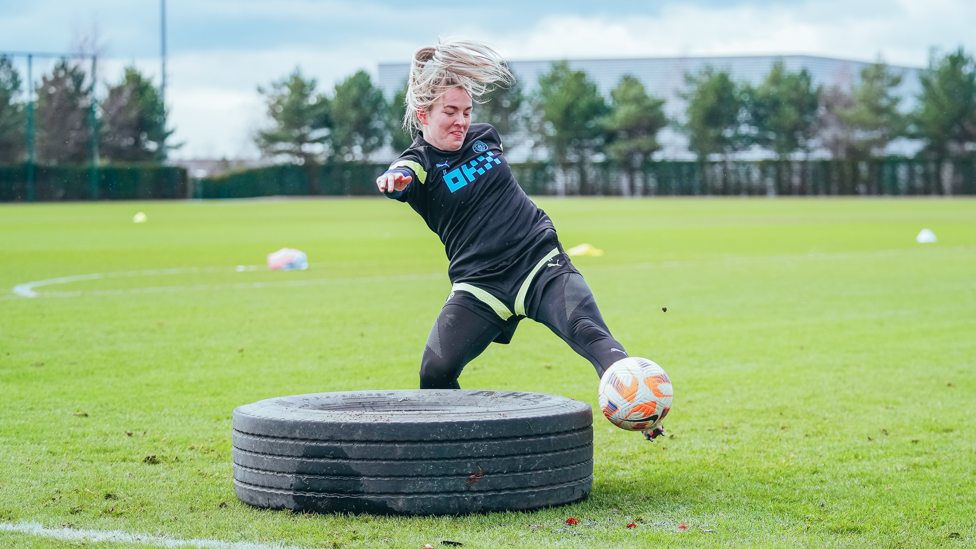 TIRING WORK : Lauren Hemp reaches for the ball