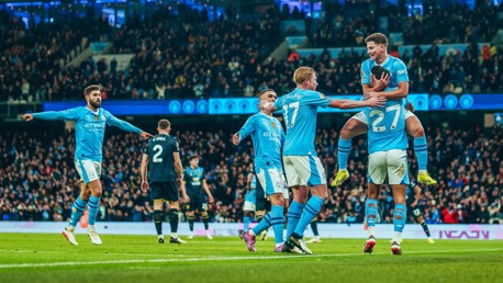 SCORER AND PROVIDER: Alvarez celebrates with Nunes.