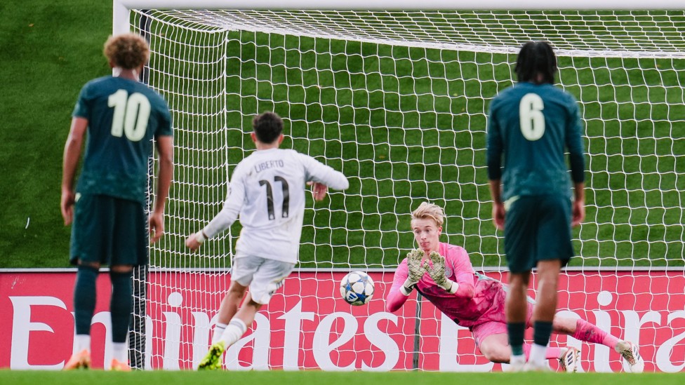 SHOT STOPPER : Spike Brits staves Liberto Navascues' spot kick.