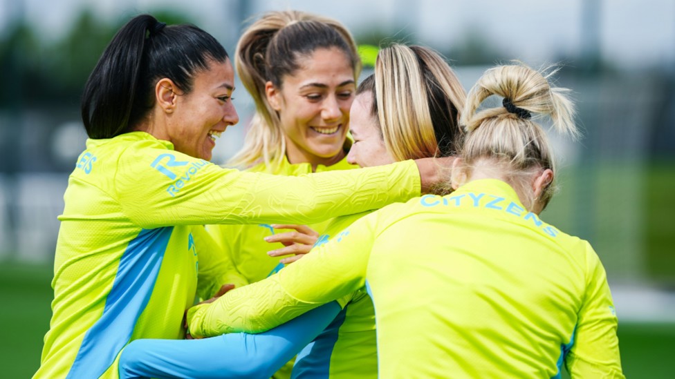 TRUE BLUES: Leila Ouahabi and Laia Aleixandri share a light hearted moment with Lauren Hemp.