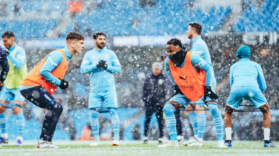 GET LOOSE : Sterling and McAtee get their muscles warm in the snow.
