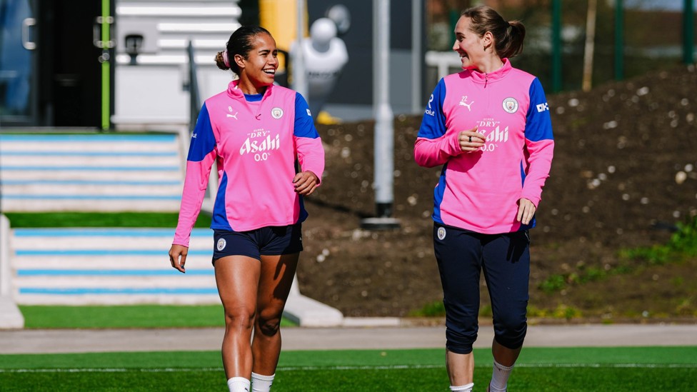 HEADING OUT  : Mary Fowler and Sydney Lohmann make their way onto the pitch.