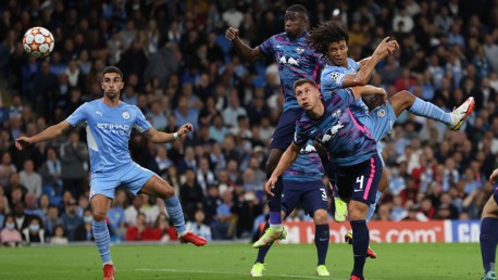 HEAD-AKE: The Dutch defender powerfully heads City ahead early on!