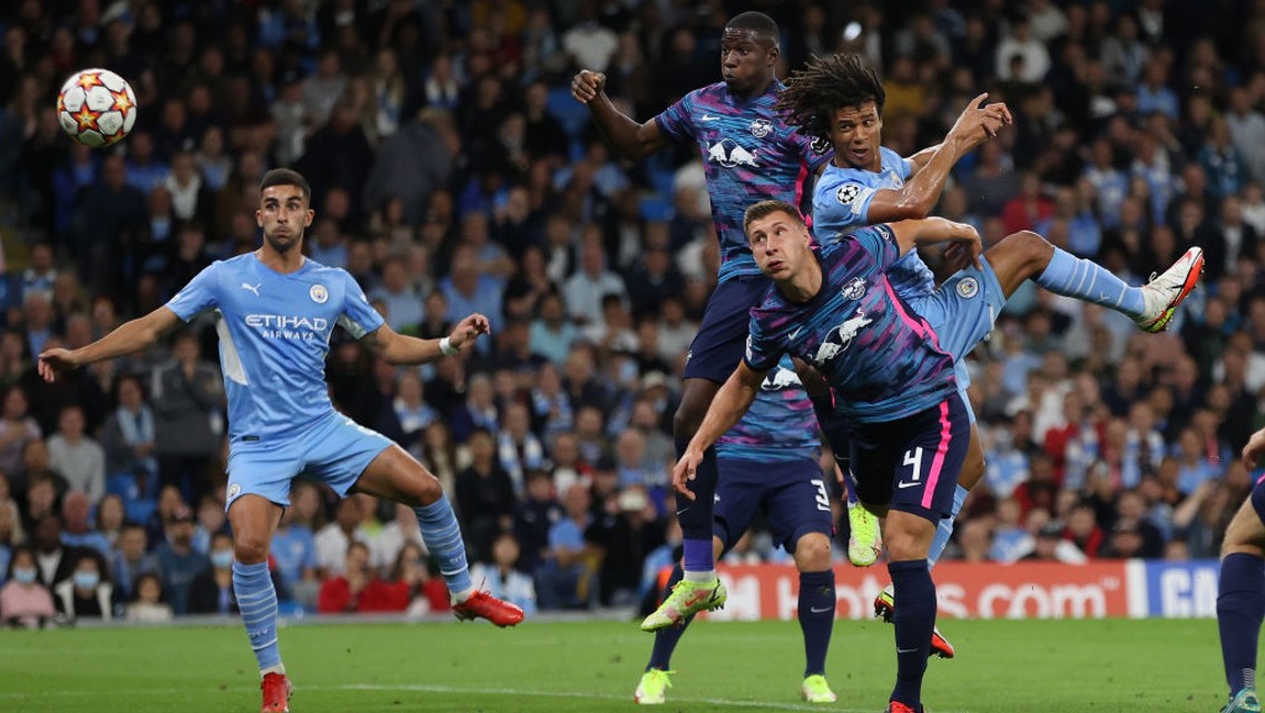 HEAD-AKE: The Dutch defender powerfully heads City ahead early on!