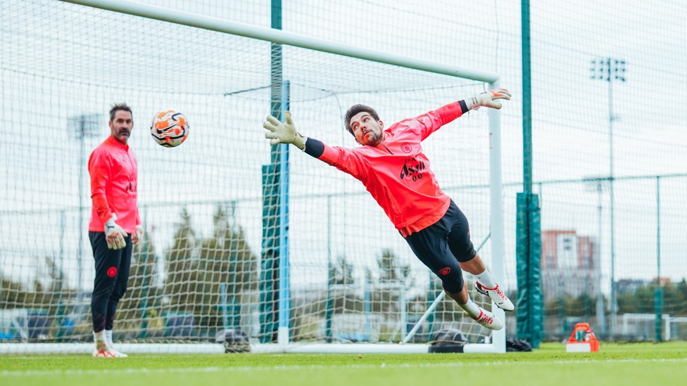 AIR STEFAN  : Stefan Ortega makes a diving save to his right.