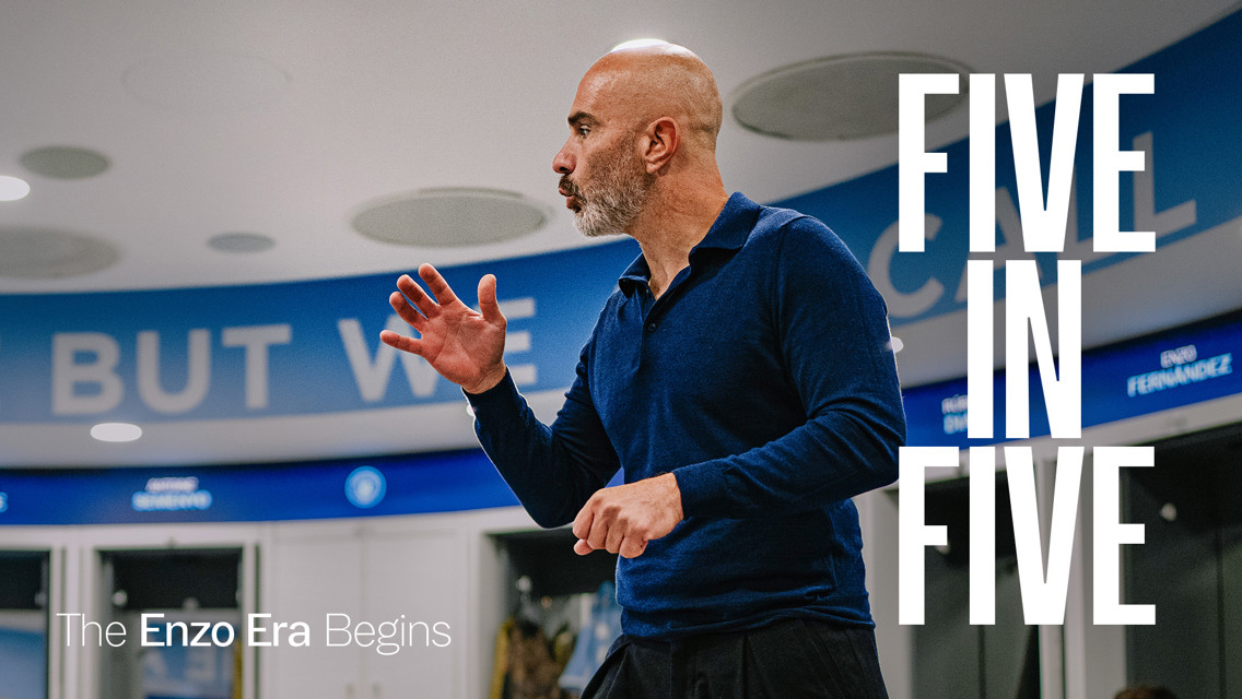 Man speaking energetically in front of locker room backdrop with motivational text. Large text on image reads 'FIVE IN FIVE' and 'The Enzo Era Begins'.