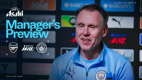 Graphic for a manager's preview featuring Arsenal and Manchester City logos. Sponsored by Asahi, with stadium coordinates. Scheduled for February 6, 2026.