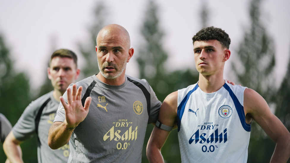 DAYLIGHT SHOT: Enzo Maresca and Phil Foden prior to sunset 