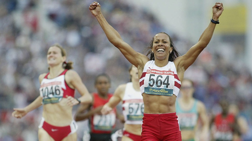 GOLD STRIKE: Kelly Holmes celebrates after taking gold in the women's 1500m