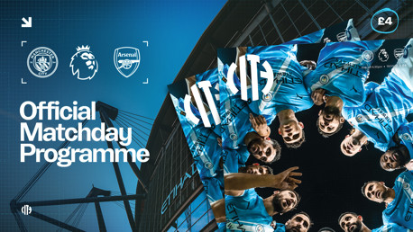 Manchester City vs Arsenal official matchday programme cover featuring logos of Manchester City, Arsenal, and the Premier League. Etihad Stadium image forms the background with team huddle photo overlay. Programme priced at £4.