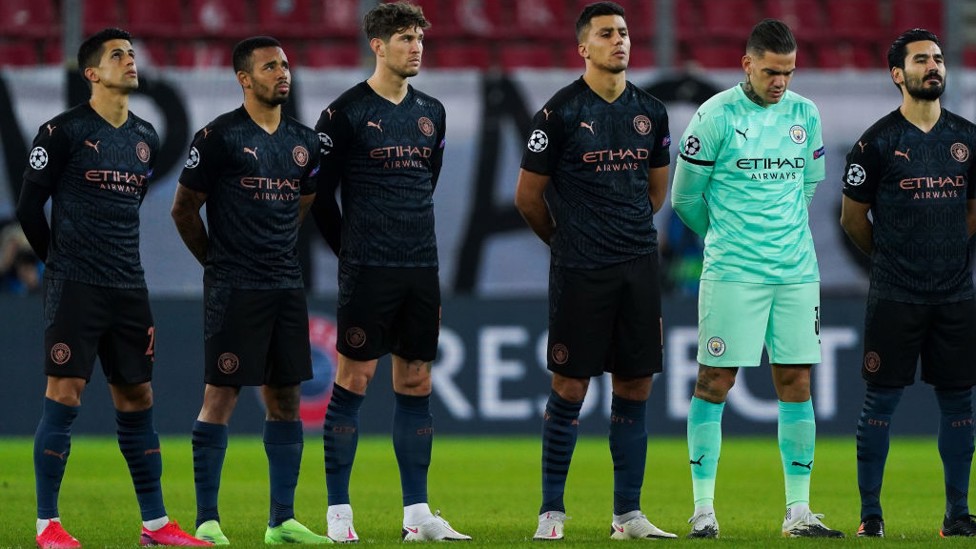 SQUAD GOALS : The starting team arrive on the pitch in Greece and observe a minute of silence in memory of the iconic Diego Maradona, who sadly passed away.