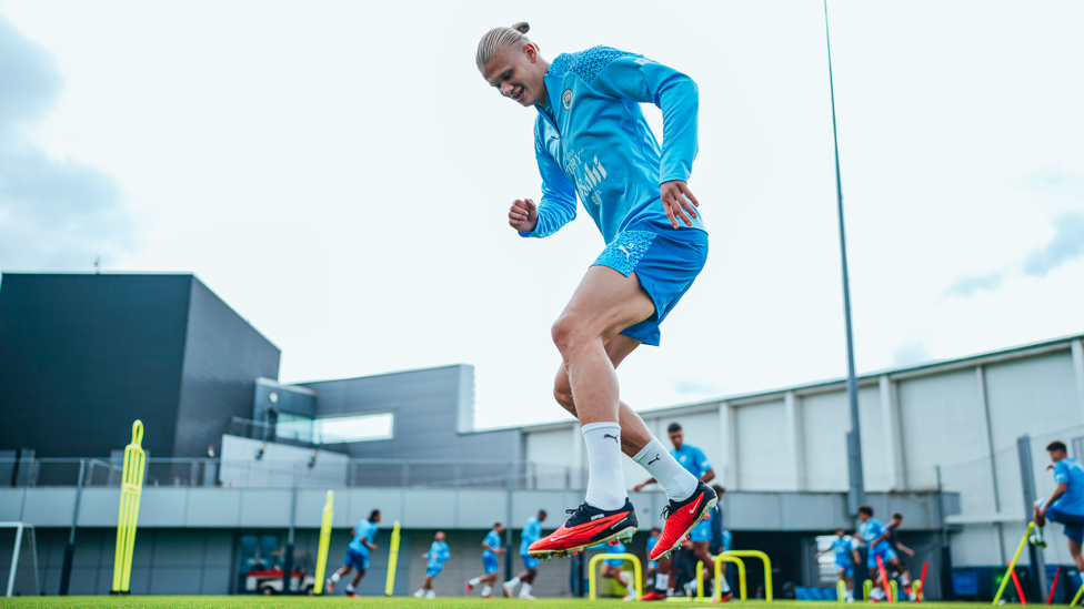 UP HIGH : Erling Haaland with a spring in his step