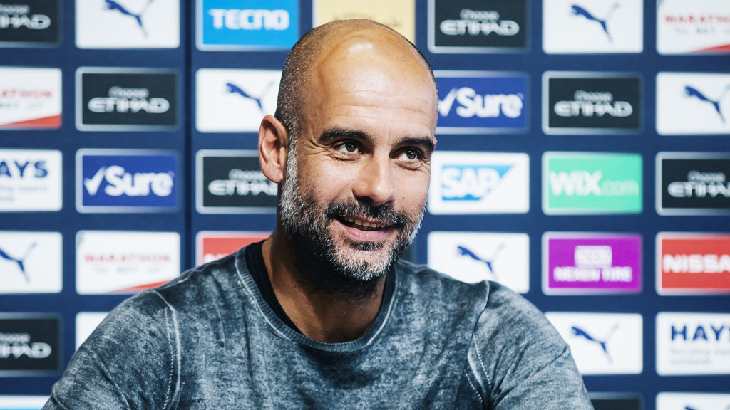 ALL SMILES: Pep Guardiola gives his thoughts ahead of City's game against Spurs on Saturday.