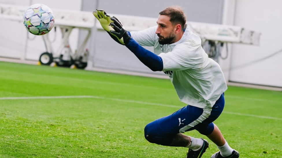 LOCKED IN : Gianluigi Donnarumma collects the shot.