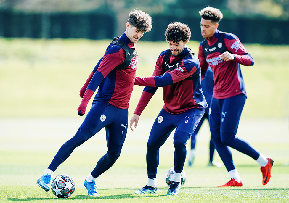 CENTRE OF ATTENTION: John Stones and Philippe Sandler vie for possession