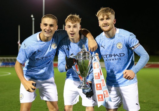 Harwood-Bellis with Cole Palmer and Tommy Doyle after Manchester City's FA Youth Cup win 2020