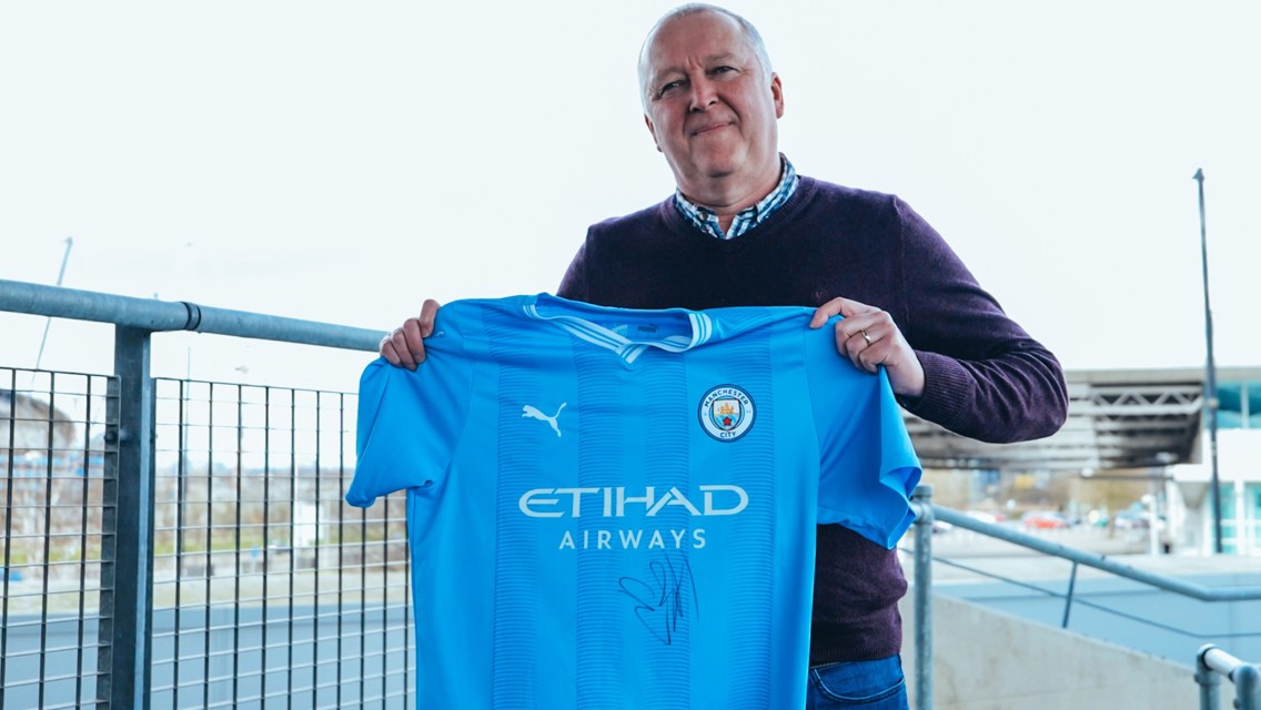 CITC prize draw winner presented with signed shirt