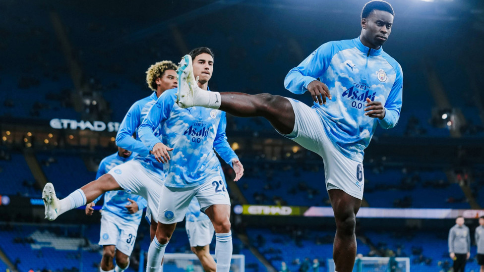 GET LOOSE : Guéhi and co go through their pre-match drills.