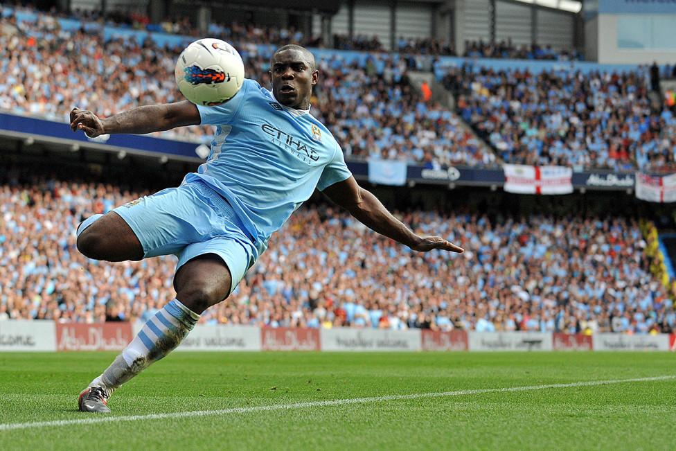 EYES ON THE PRIZE : Richards on the stretch as he looks to connect with the ball mid-air during City’s Premier League game against Wigan Athletic