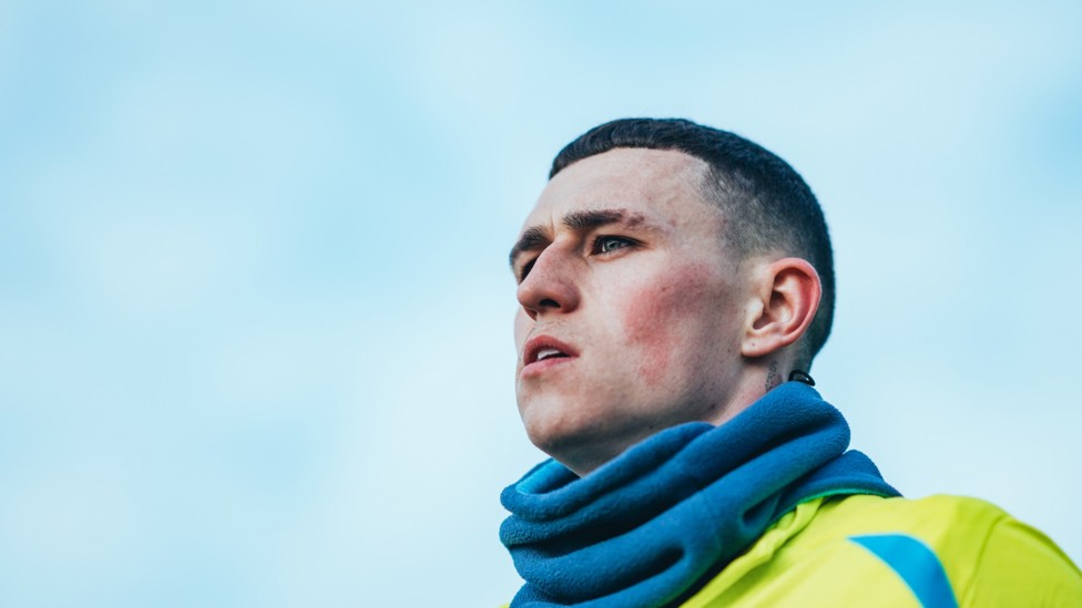 ONE OF OUR OWN  : Phil Foden heads out onto the training field. 