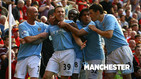 DERBY DAYS: Craig Bellamy celebrates against Manchester United.