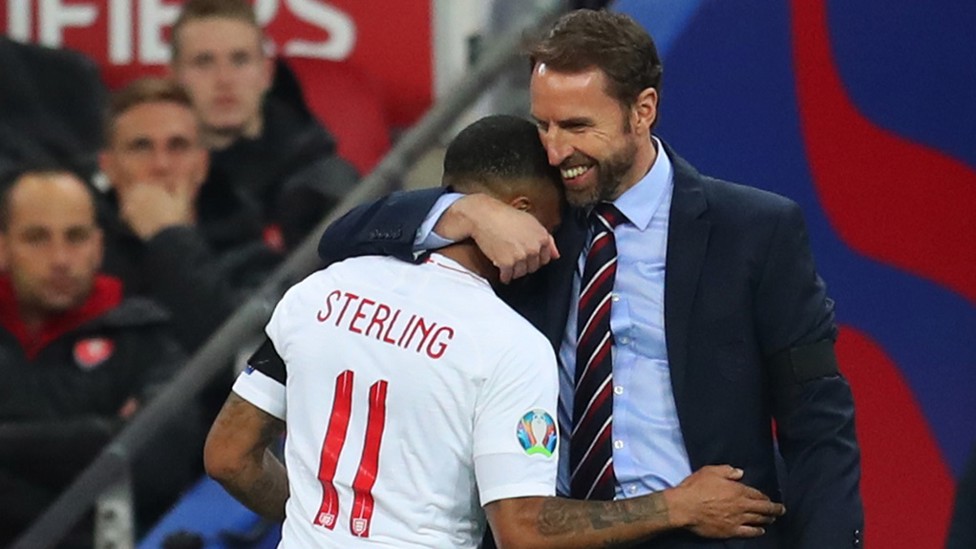 WELL DONE, SON! Gareth Southgate is delighted with Raheem's display