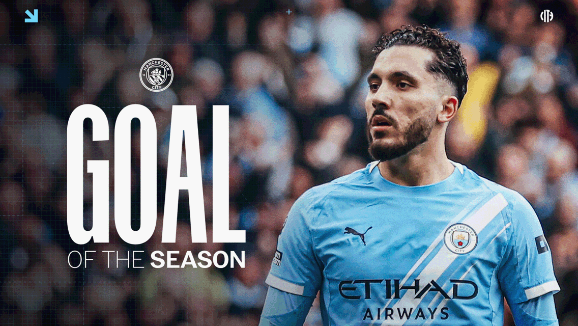 Blurred person in a Manchester City jersey, with text 'GOAL OF THE SEASON' and Manchester City logo visible.