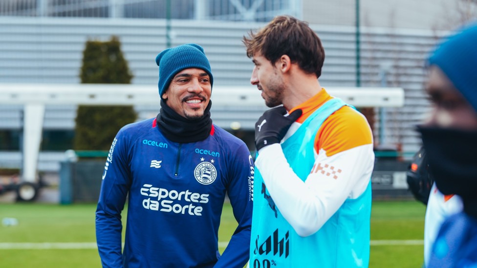 STRONG FOUNDATIONS  : Bahia defender Gilberto and Ruben Dias converse.