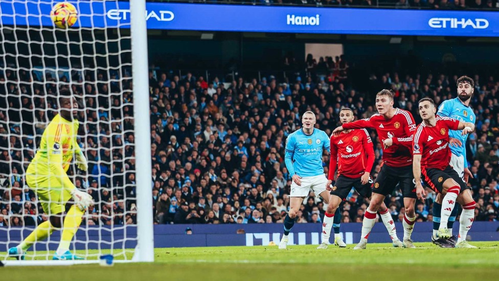 DERBY GOAL : Josko Gvardiol heads home the opener in the festive fixture with Manchester United in 2024.