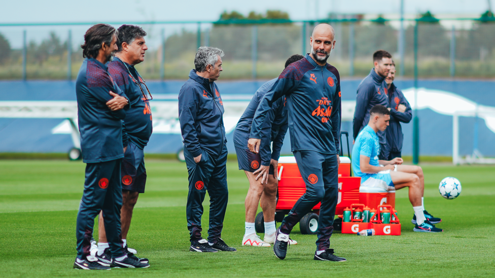 PEP TALK : The boss watches on with his coaching team